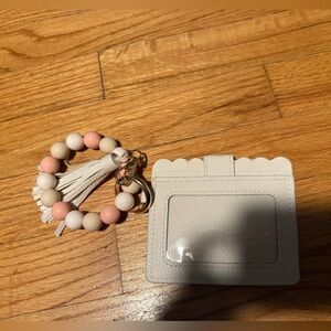 Light tan card holder with beaded wristlet
